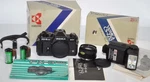 Yashica Fx-3 Super 2000 Slr Camera Black W/ 50mm F/1.9 Cs220 Flash Mint In Box. Fixed Price $299.95.